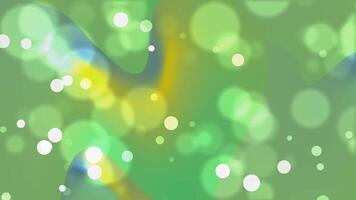 A soft, blurred background featuring green bokeh lights with scattered white circles. The design creates a serene, dreamy effect with a calming atmosphere. video