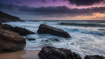 A serene coastal scene with waves crashing against rocky formations under a dramatic sky at sunset. photo