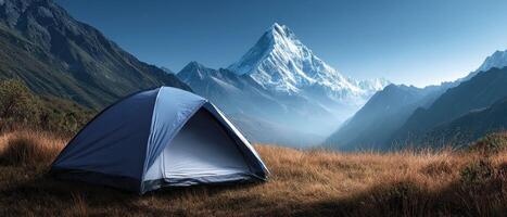 Lone Tent Against Majestic Mountain Landscape Nature Scene Background with Copyspace photo