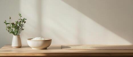 Serene minimalist table setup with plants and rice bowl bright interior natural light photo
