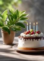 Birthday celebration cake with candles and greenery indoor setting close-up view for special moments photo