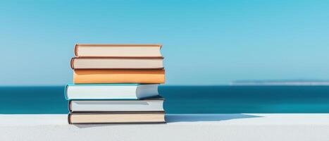 Reading books by the ocean seaside photography bright environment close-up relaxation photo