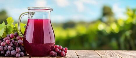 Refreshing grape juice pitcher on wooden table vineyard background beverage photography natural setting photo