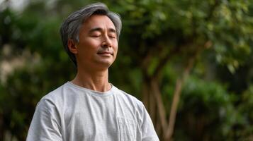 Meditation practice embraced by man in tranquil garden lifestyle photography peaceful environment photo