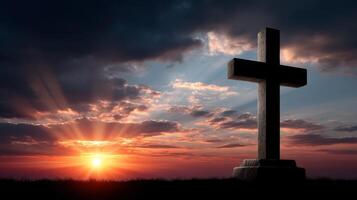 Sunset view of a cross silhouette religious symbol landscape nature spiritual reflection photo
