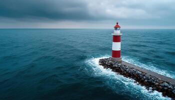 Lighthouse standing tall against stormy skies coastal landscape aerial photography ocean environment photo