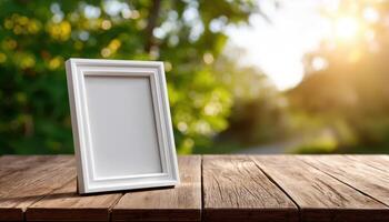 Empty picture frame on rustic wooden table in serene outdoor setting capturing light and nature photo