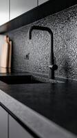 Stylish Modern Kitchen Design with Black Granite Countertop photo