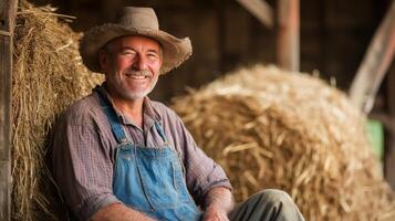 Smiling Farmer in a Hay Barn - A Portrait of Rural Life photo