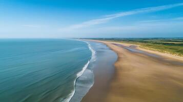 Stunning Coastal View Golden Beach Meets Azure Sea photo