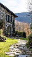 Rustic Stone House with a Picturesque Garden Path photo