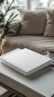 A Blank Book on a Stylish Coffee Table in a Modern Home photo
