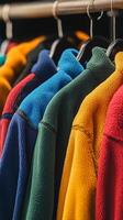 Colorful Fleece Jackets on Display in a Store photo