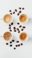 Four Espresso Cups with Coffee Beans - A Perfect Morning Start photo