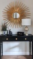 Stunning Black Console Table with Gold Accents and Sunburst Mirror photo