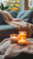 Cozy Candles on a Knitted Blanket - A Warm Home Ambiance photo