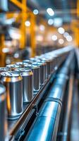 Aluminum Cans Moving on Conveyor Belt in a Modern Factory photo