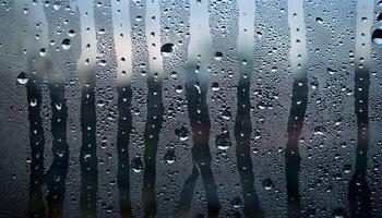 A window with rain drops on it photo