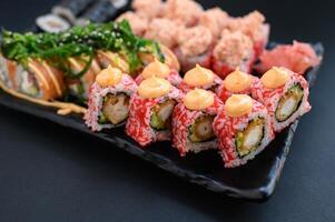 Assorted sushi rolls arranged artistically, showcasing a balance of color and texture. photo
