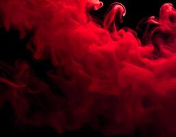 Red Smoke Swirling on Black Background for Abstract Design and Atmospheric Effects photo