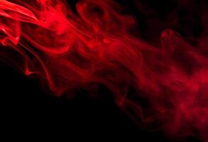 Red Smoke Swirls on Black Background for Abstract Design and Atmospheric Visual Effects photo