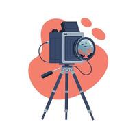 Professional vintage camera mounted on adjustable tripod with close-up lens focused on underwater scene featuring fish and coral, isolated on abstract orange background vector