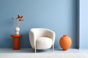 Stylish empty wall with blank copy space featuring a modern chair, a round table, an orange vase, and decorative vase with dried flowers in a cozy interior setting photo