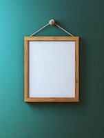 Blank frame for wall art mockup showcasing a modern design set against a teal background, ideal for adding personalized artwork or decor for interior spaces photo
