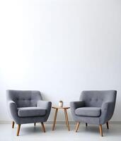 Empty wall with blank copy space framed by two modern chairs and a side table, creating a minimalist interior design aesthetic photo
