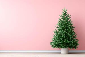 Empty wall with blank copy space and a green Christmas tree in a light-toned room inviting holiday cheer and decoration photo