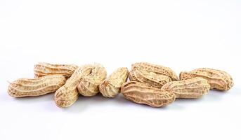 peanut, dried groundnuts, monkey nut on white background photo