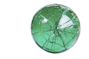 A shattered green glass sphere with intricate cracks creates striking visual effect, symbolizing fragility and transformation. broken surface reflects light, adding depth and complexity png