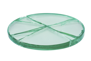 A round, broken glass plate with visible cracks and jagged edges lies on transparency background, showcasing its fragile and shattered state png