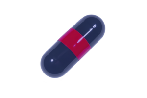 A large, glossy capsule pill with striking red and black color scheme is isolated on transparency background, showcasing its sleek design and vibrant contrast png