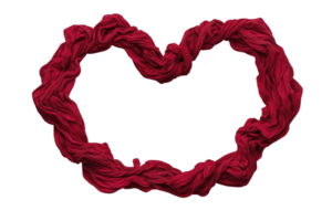 A vibrant red fabric is artistically arranged in shape of heart, symbolizing love and passion. texture of cloth adds depth and movement to design, creating dynamic visual effect png