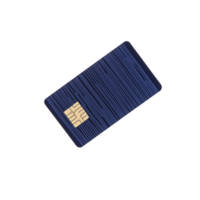 blue credit card with chip is displayed against transparency background, showcasing its sleek design and modern technology. card is angled slightly, emphasizing chip placement png