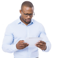 A man in light blue shirt is intently reading tablet, wearing glasses and standing against plain background. His focused expression suggests concentration and engagement with content on device png
