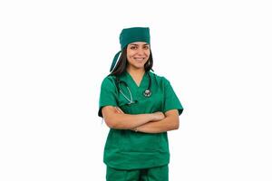 Confident Latin surgeon smiling with arms crossed on white background photo