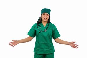 Latin female surgeon wearing green scrubs and stethoscope showing something with hands photo