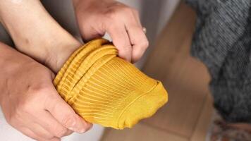 How to put on colorful socks effortlessly with a simple technique video