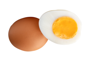 Raw eggs and cooked or boiled chicken egg with egg yolk in half in stack isolated with clipping path in file format png