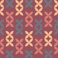 Colorful geometric pattern featuring interconnected leaves on a warm background ideal for textile design vector