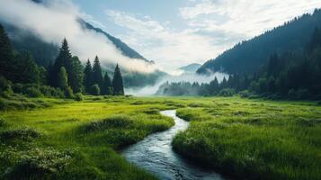 A serene landscape featuring a winding stream surrounded by lush green meadows and misty mountains under a bright sky. photo