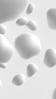 Smooth clean white blob shapes gently floating across the frame. Modern minimalist design. Clean and contemporary vertical motion background. video
