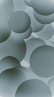 Gently moving dark shaded spheres abstract background. This geometric sphere shapes vertical animation is full HD and looping. video