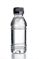 Close-up of Water Bottle with Condensation and Black Cap on White photo