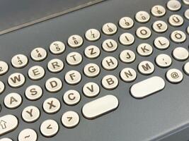 Retro german keyboard layout with circular keys and symbols photo