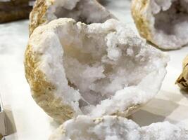 Sparkling quartz geode display with rough stone texture photo
