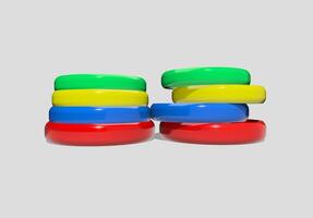 A stack of colorful rings on a white background photo