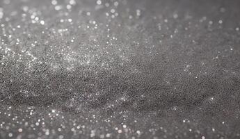 A close up of a shiny silver surface photo